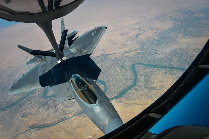 A U.S. Air Force F-22 Raptor departs after receiving fuel from a KC-135 Stratotanker, assigned to the 340th Expeditionary Air Refueling Squadron, during a mission in support of Operation Inherent Resolve Aug. 29, 2017. The F-22 is a component of the Global Strike Task Force, supporting U.S. and Coalition forces working to liberate territory and people under the control of ISIS. (U.S. Air Force photo by Staff Sgt. Michael Battles)
