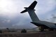 Under cloudy skies, an Air Force Reserve Command C-5M Super Galaxy, flown by Reserve Citizen Airmen with the 433rd Airlift Wing at Joint Base San Antonio-Lackland, Texas, is unloaded at Ceiba, Puerto Rico Oct. 1, 2017.  The cargo included 11 Soldiers from the 247th Composite Supply Company, 68th Sustainment Support Battalion, 4th Sustainment Brigade, 4th Infantry Division, supplies, fuel trucks and a communications vehicle to be employed in relief efforts in Puerto Rico after Hurricane Maria struck the American commonwealth with a Category 4 storm. (U.S.  Air Force photo by Tech. Sgt. Carlos J. Treviño)