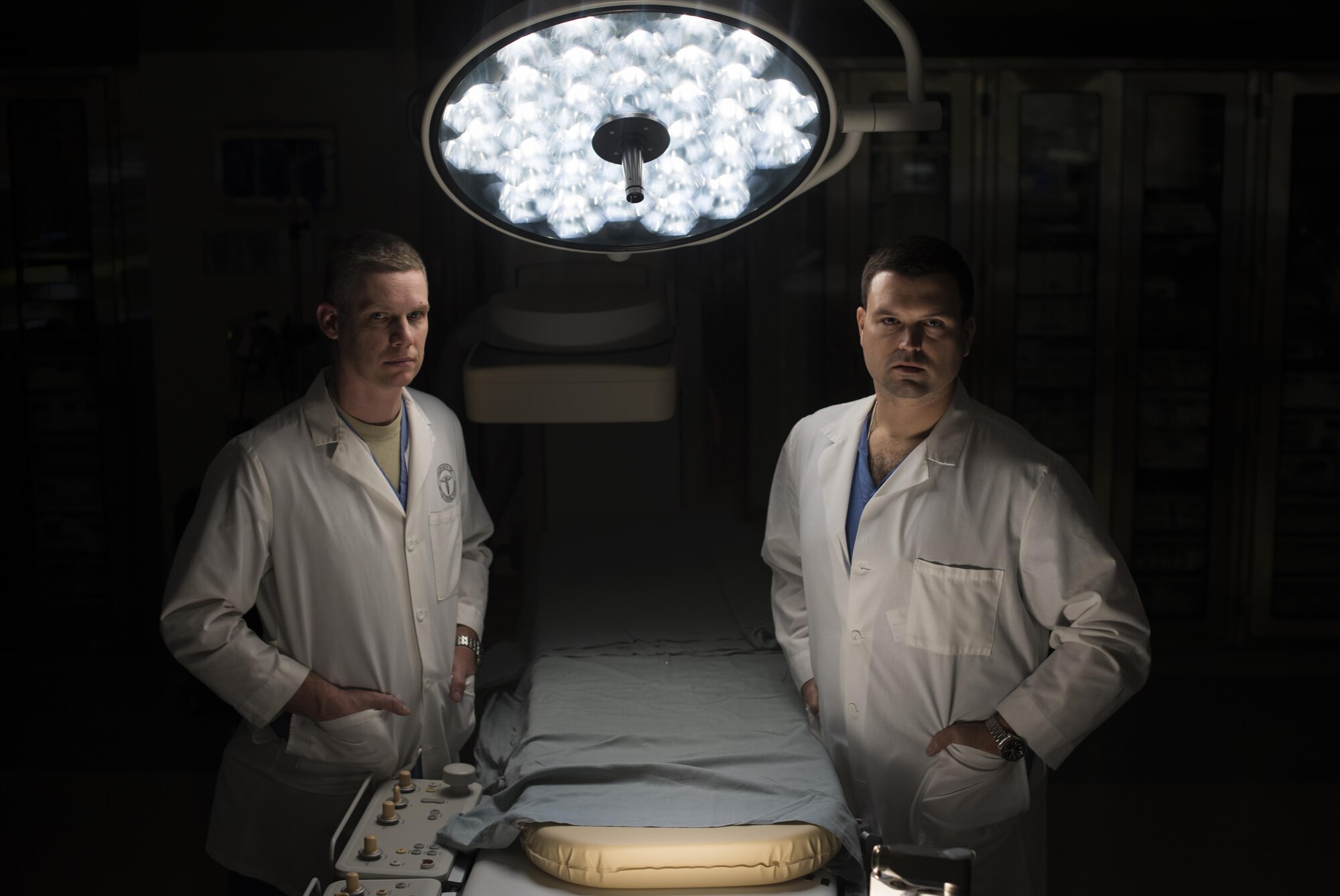 Lt. Col. Jason Compton and Maj. Charles Chesnut, 99th Medical Group general surgeons, pose for a portrait in the Mike O’Callaghan Military Medical Center at Nellis Air Force Base, Nev., Oct. 3, 2017. The surgeons were two members of the team that took in trauma patients at the University Medical Center of Southern Nevada during the Las Vegas shooting, Oct. 1, 2017.  (U.S. Air Force photo by Senior Airman Kevin Tanenbaum)