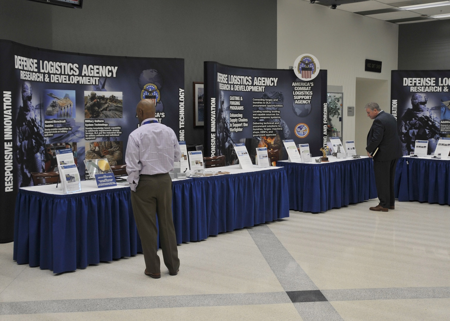 Info booths; persons viewing materials