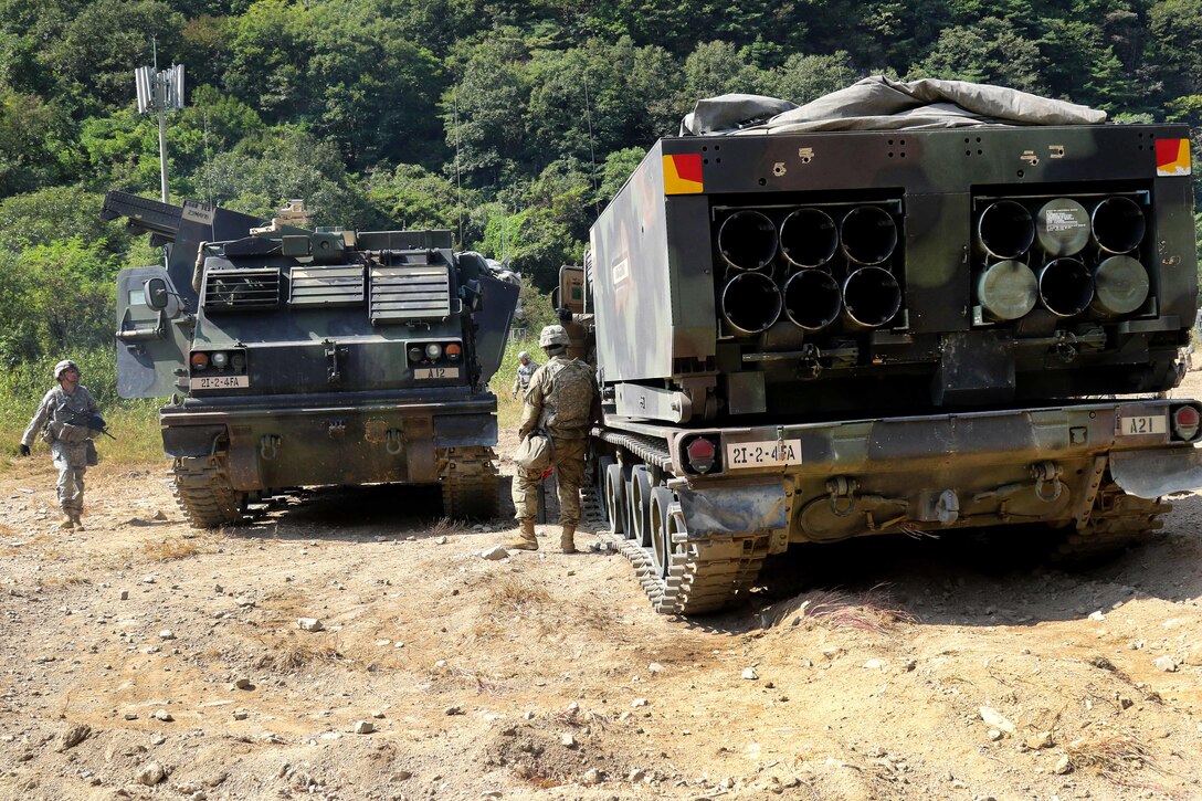 U.S. soldiers switch crews on M270 multiple launch rocket systems at Rocket Valley, Cheorwon, South Korea.