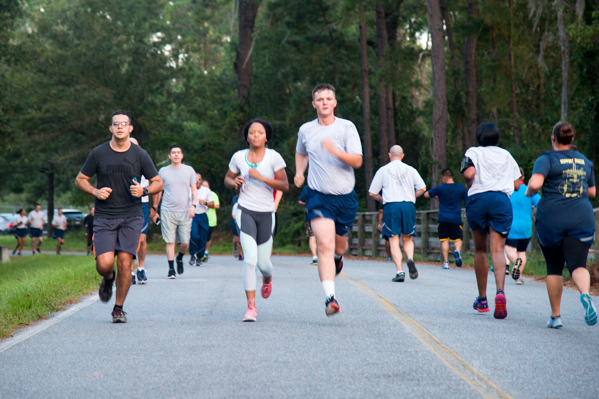 Airmen run during a Violence Prevention Awareness 5K, Oct. 4, 2017, at Moody Air Force Base, Ga. Moody leadership proclaimed October as Violence Prevention Awareness Month in order to recognize and educate Airmen and families about suicide prevention, drug abuse, stalking awareness and domestic violence prevention. (U.S. Air Force photo by Airman 1st Class Erick Requadt)