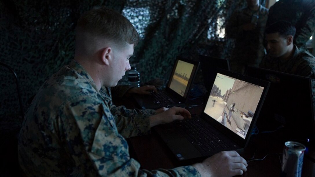 A Marine uses Virtual Battle Space 3 in Marine Corps Base Camp Lejeune, North Carolina. VBS 3 is part of the Tactical Decision Kit developed jointly by Marine Corps Systems Command, the Marine Corps Warfighting Lab’s Rapid Capabilities Office and the Office of Naval Research.