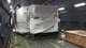 A sonar window dome being transported in a C-5 aircraft, to repair the USS Antietam, a Ticonderoga class cruiser ship which was damaged after running aground in Tokyo Bay, Japan earlier in the year. The Air Force Life Cycle Management Center's Air Transportability Test Loading Activity office located at Wright-Patterson Air Force Base, certified that the load was safe for flight and designed fixtures to restrain and protect it. (courtesy photo)
