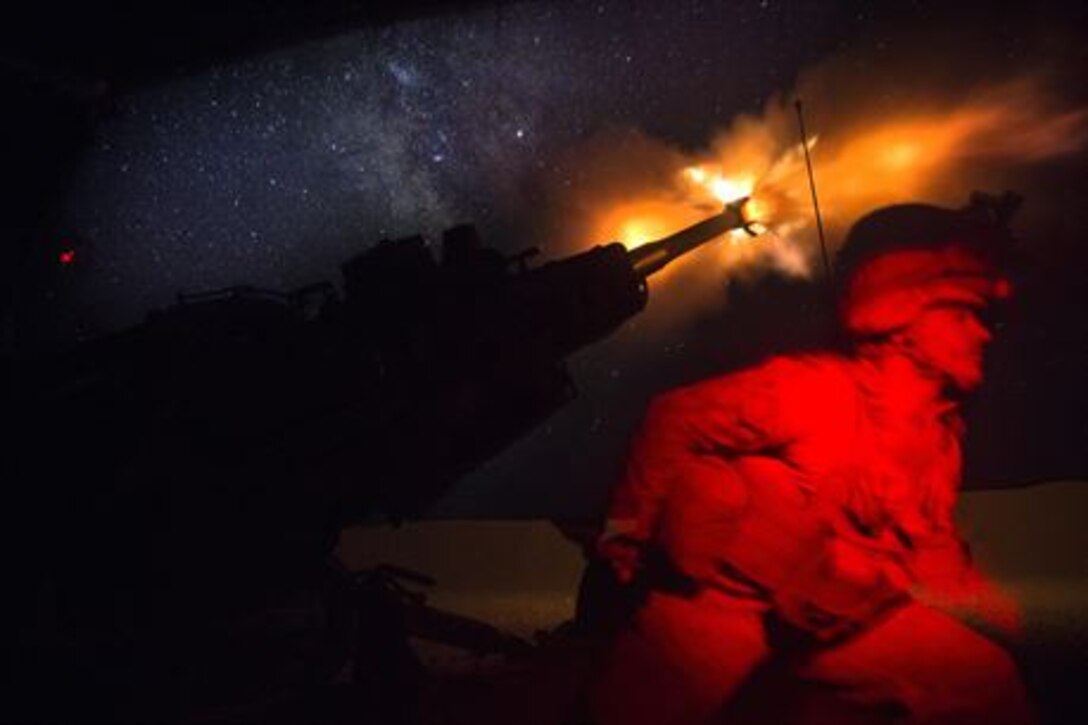 A U.S. Marine fires an M777-A2 Howitzer in the early morning in Syria, June 3, 2017. They have been conducting 24-hour all-weather fire support for the Coalition’s local partners, the Syrian Democratic Forces, as part of Combined Joint Task Force-Operation Inherent Resolve. CJTF-OIR is the global coalition to defeat ISIS in Iraq and Syria.