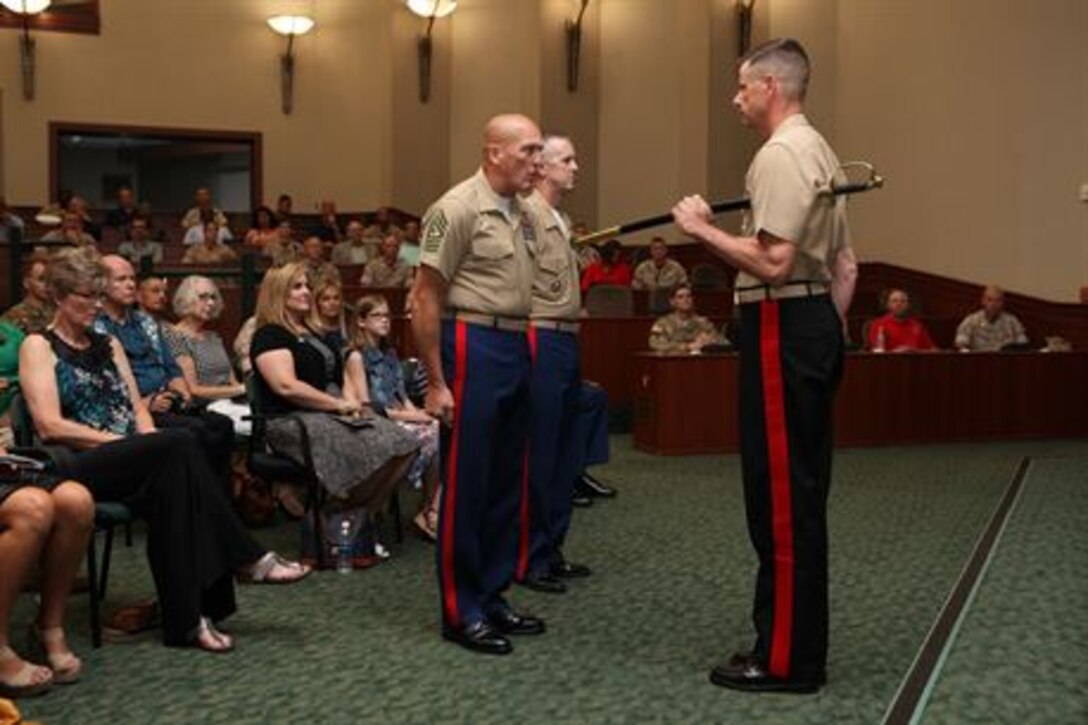 United States Marine Corps Forces, Central Command bid farewell to its senior enlisted leader and welcomed another during a relief and appointment ceremony held at the Davis Conference Center aboard Air Force Base MacDill, in Tampa, Fla., June 30. Sergeant Maj. William T. Thurber replaced Sgt. Maj. Lawrence P. Fineran as sergeant major of MARCENT. Lieutenant Gen. William D. Beydler, MARCENT commander, presided over the event, that also doubled as a retirement ceremony for Fineran.