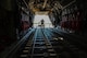 Airmen position a K-loader carrying water and ready-to-eat meals behind a C-130 Hercules at Dobbins Air Reserve Base, Ga. Oct. 4. Airmen loaded a Mansfield Air National Guard C-130 with a total of 23,390 pounds of food and water which will be transported to Puerto Rico and distributed to those in need. (U.S. Air Force photo by Tech. Sgt. Kelly Goonan)