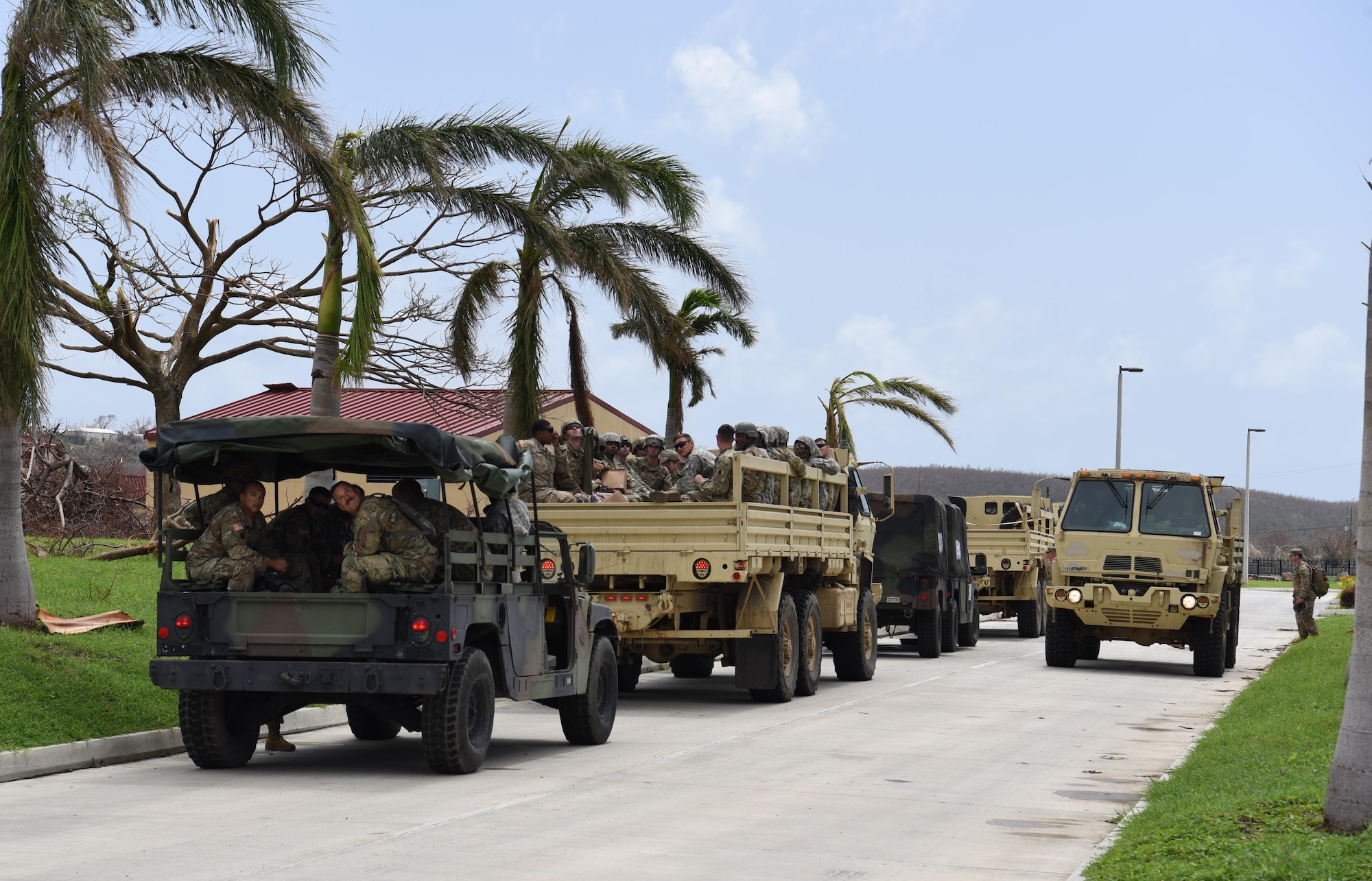 A National Guard convoy rolls out of the armory in St. Croix, U.S Virgin Islands in order to provide aid to the local community, September 28, 2017. Hurricane Maria left many on the island without food or water. (U.S. Air National Guard photo by Tech. Sgt. Gregory Ferreira/Released)