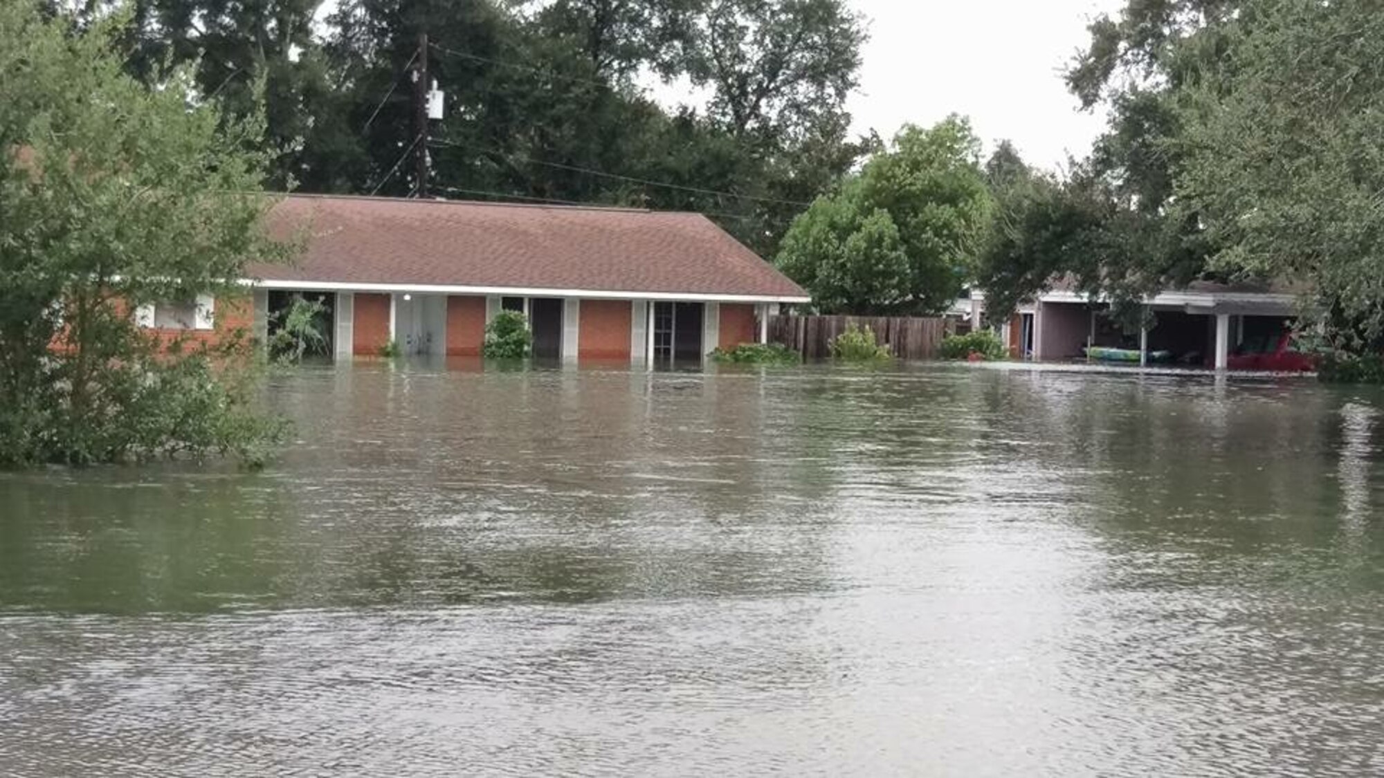 A flooded landscape in and around Orange, Texas, greeted Staff Sgt. Mark Doyle when he arrived in the state on Aug. 31. Doyle, an airfield systems technician with the 42nd Operations Support Squadron, assisted with rescue efforts from his home in Montgomery, Alabama, before deciding to head to Texas to see how he could help in person. (Courtesy photo)