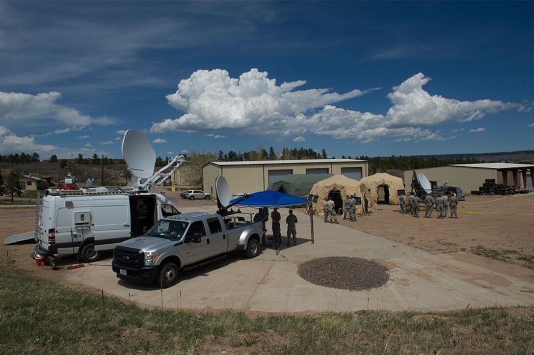 Airmen of the 379th Space Range Squadron evaluate frequency spectrums within a virtual space range environment during field training exercises May 6, 2017.