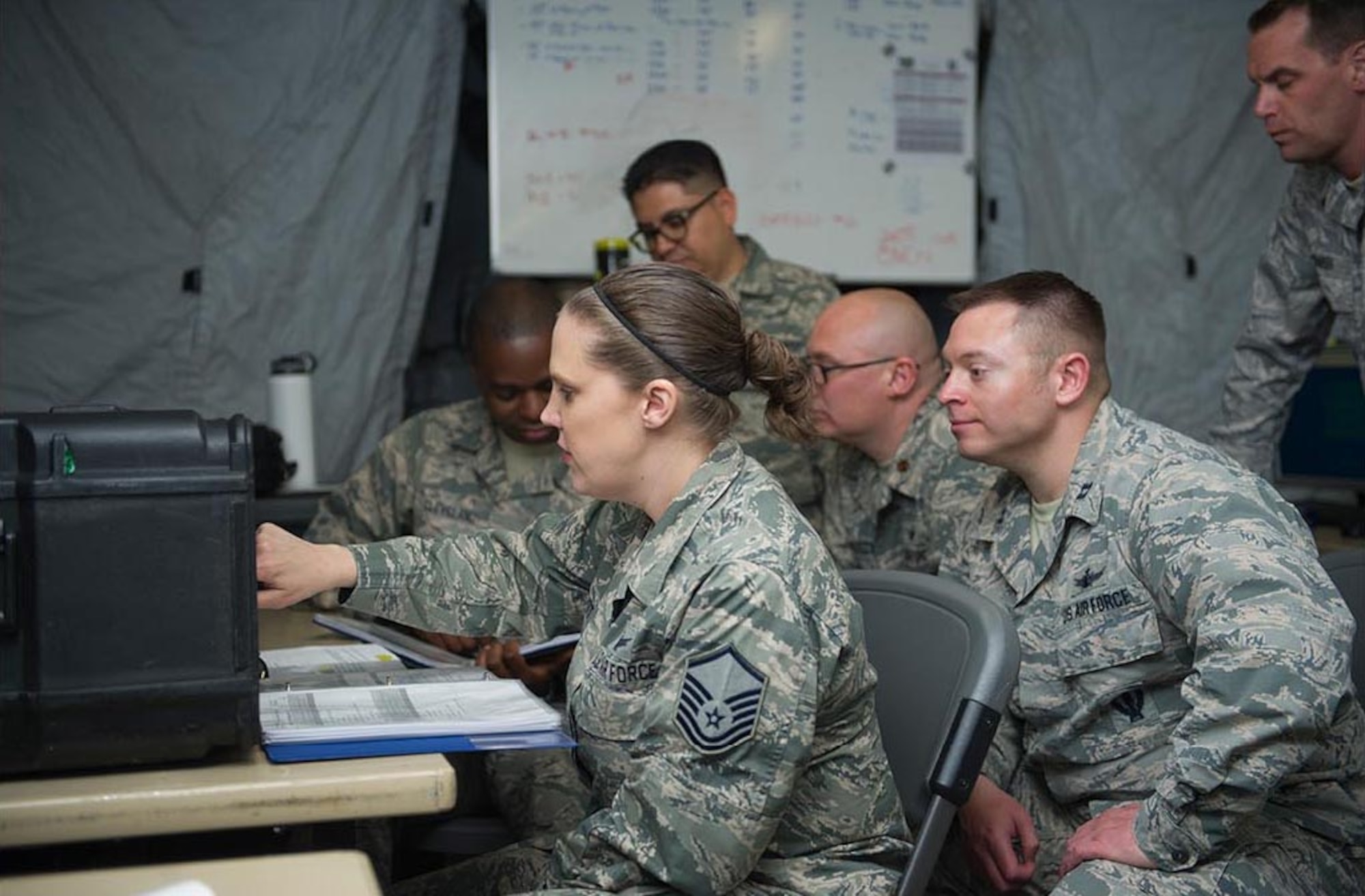 Operators and radio frequency technicians of the 379th Space Range Squadron utilize a field laboratory for training on satellite location acquisition and signal monitoring May 6, 2017.