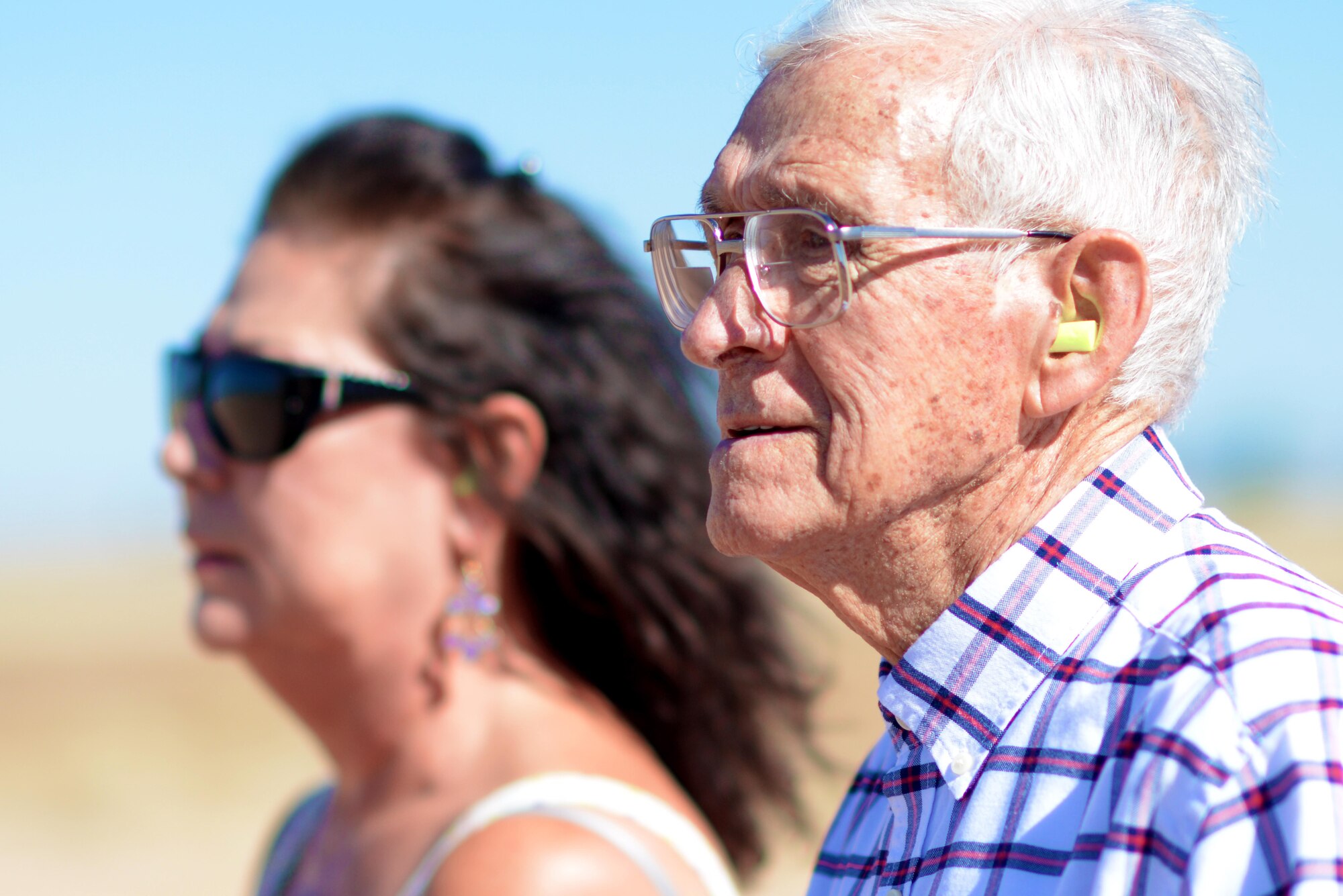 Manuel Martinez, a World War II veteran, and his family watch fighter jet takeoffs during a tour at Luke Air Force Base, Ariz., Oct. 2, 2017. Martinez was able to see first-hand how Luke builds the future of airpower. (U.S. Air Force photo by Senior Airman Devante Williams)