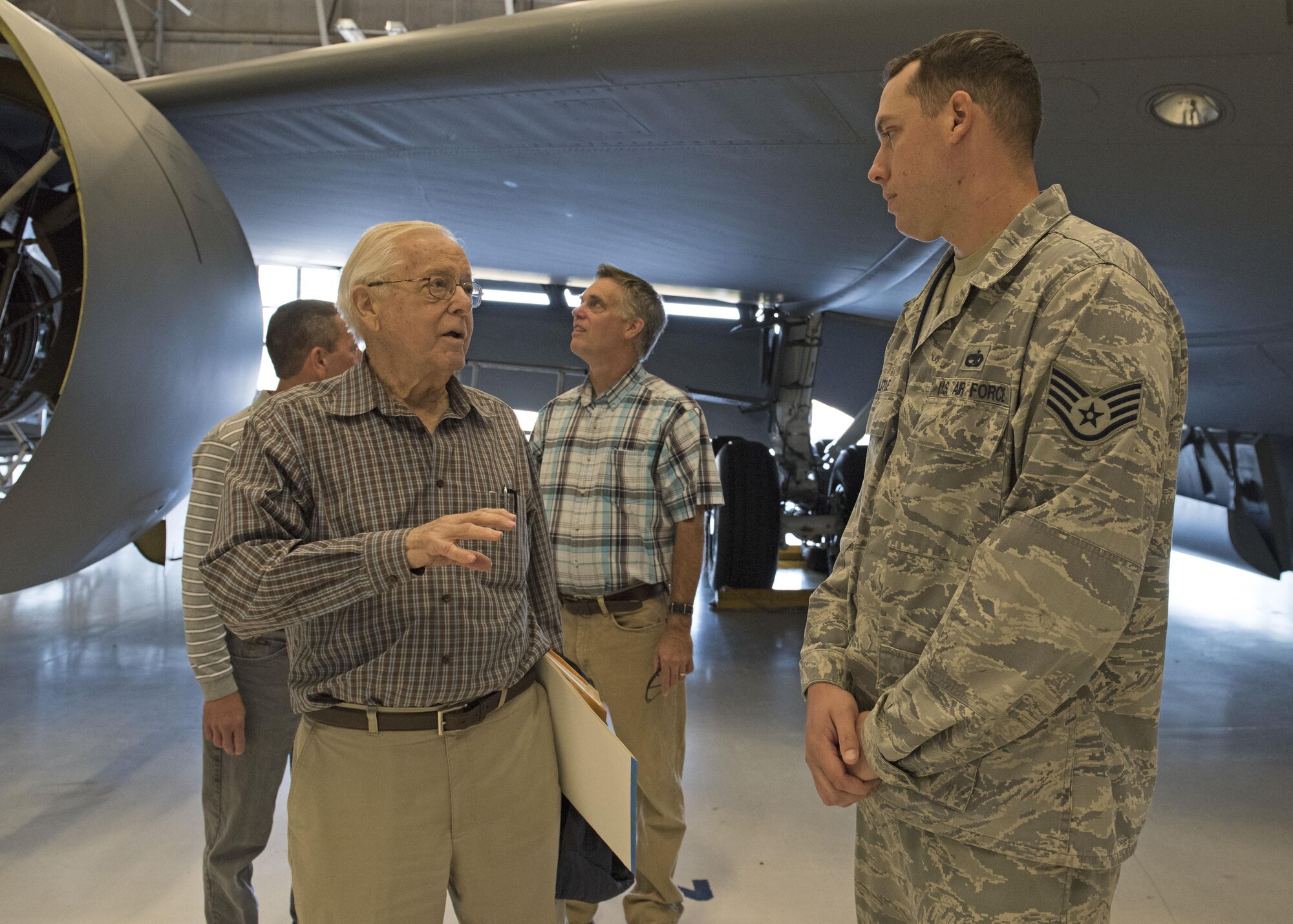 George Prentiss, a Korean War and Air Force veteran, discusses the KC-135 Stratotanker with Staff Sgt. Nicholas Little, 92nd Maintenance Squadron aerospace propulsion technician, during a base tour at Fairchild Air Force Base, September 29, 2017. Prentiss joined the Air Force in 1952 as a piston jet maintainer and was stationed at Fairchild for four years. He toured Fairchild 63 years later as part of his bucket list. (U.S. Air Force photo by Airman 1st Class Jesenia Landaverde)