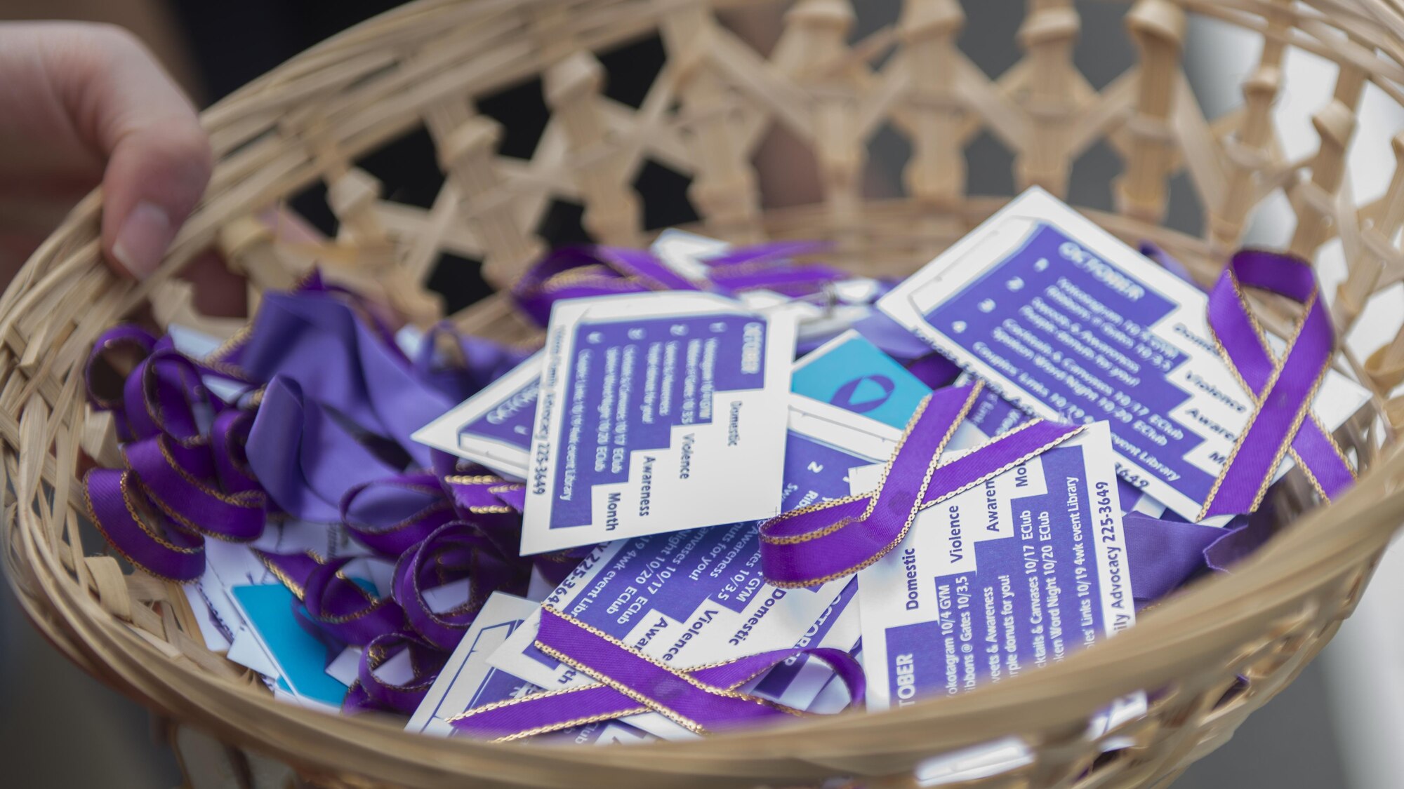 The Family Advocacy office passed out cards and purple ribbons during Domestic Violence Awareness Month, Oct. 3, 2017, at Yokota Air Base, Japan.