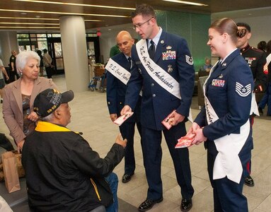 Joint Base San Antonio Air Force Ambassadors  Tech. Sgt. Steven Nowicki and Tech. Sgt. Jacqueline I. Crow pass out valentines at the Valentines for Vets event at the Veterans Affairs hospital in San Antonio in 2016.