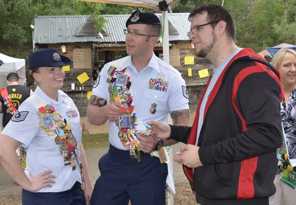 Joint Base San Antonio Air Force Ambassadors  Tech. Sgt. Jacqueline I. Crow and Tech. Sgt. Steven Nowicki take part in the Taste of New Orleans event at the Sunken Gardens Amphitheatre in San Antonio in 2016.