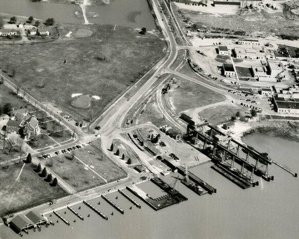 IMAGE: 03/31/1955
AEROGRAPHIC HISTORY: Oblique angle of Naval Proving Ground, Old Wharf district.