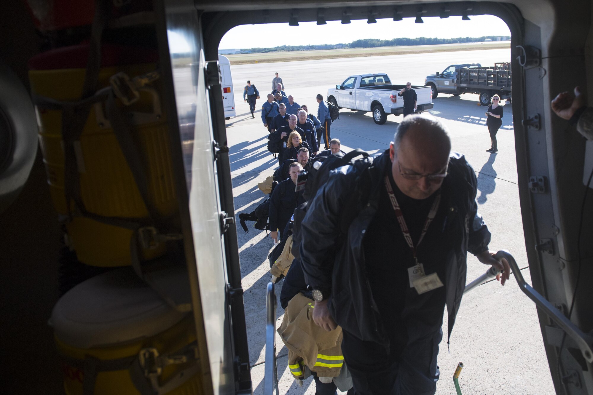 passengers boarding aircraft