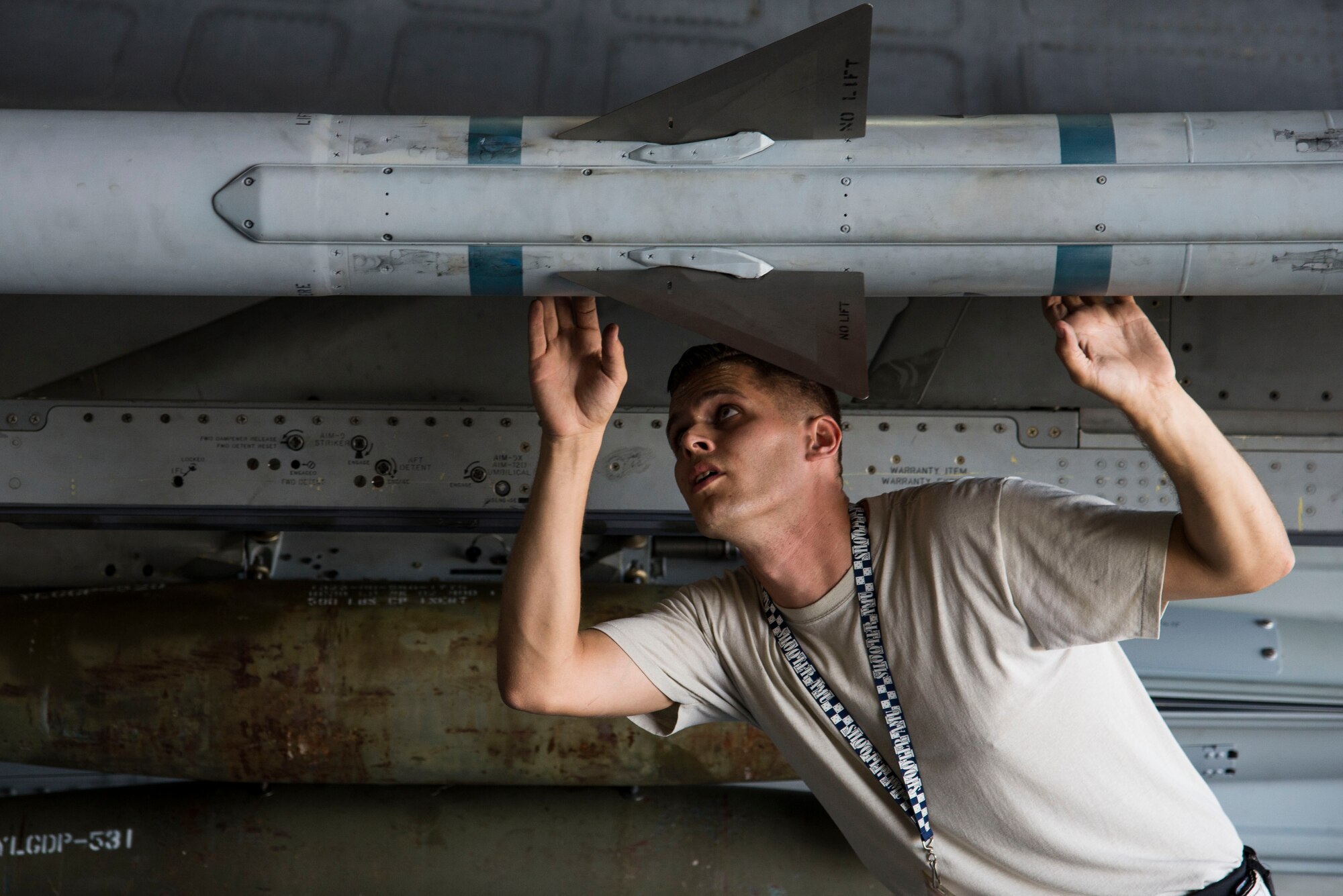 U.S. Air Force Staff Sgt. Jeffrey Kohler, 20th Aircraft Maintenance Squadron load crew team chief, inspects an AIM-120 advanced medium-range air-to-air missile during a quarterly load crew competition at Shaw Air Force Base, S.C., Oct. 4, 2017.