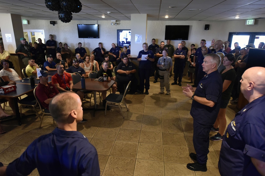 Coast Guard Rear Adm. Peter J. Brown, commander of the Coast Guard Seventh District, adresses personnel at the Emergency Operations Center during a visit to Aguadilla, Puerto Rico.