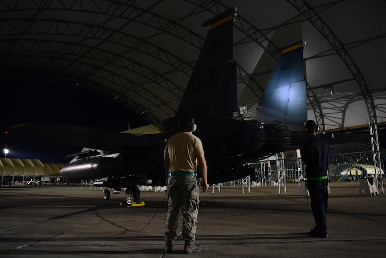 Members of the 4th Aircraft Maintenance Squadron perform routine inspection on an F-15E Strike Eagle, Oct. 6, 2017, at Seymour Johnson Air Force Base, North Carolina.
