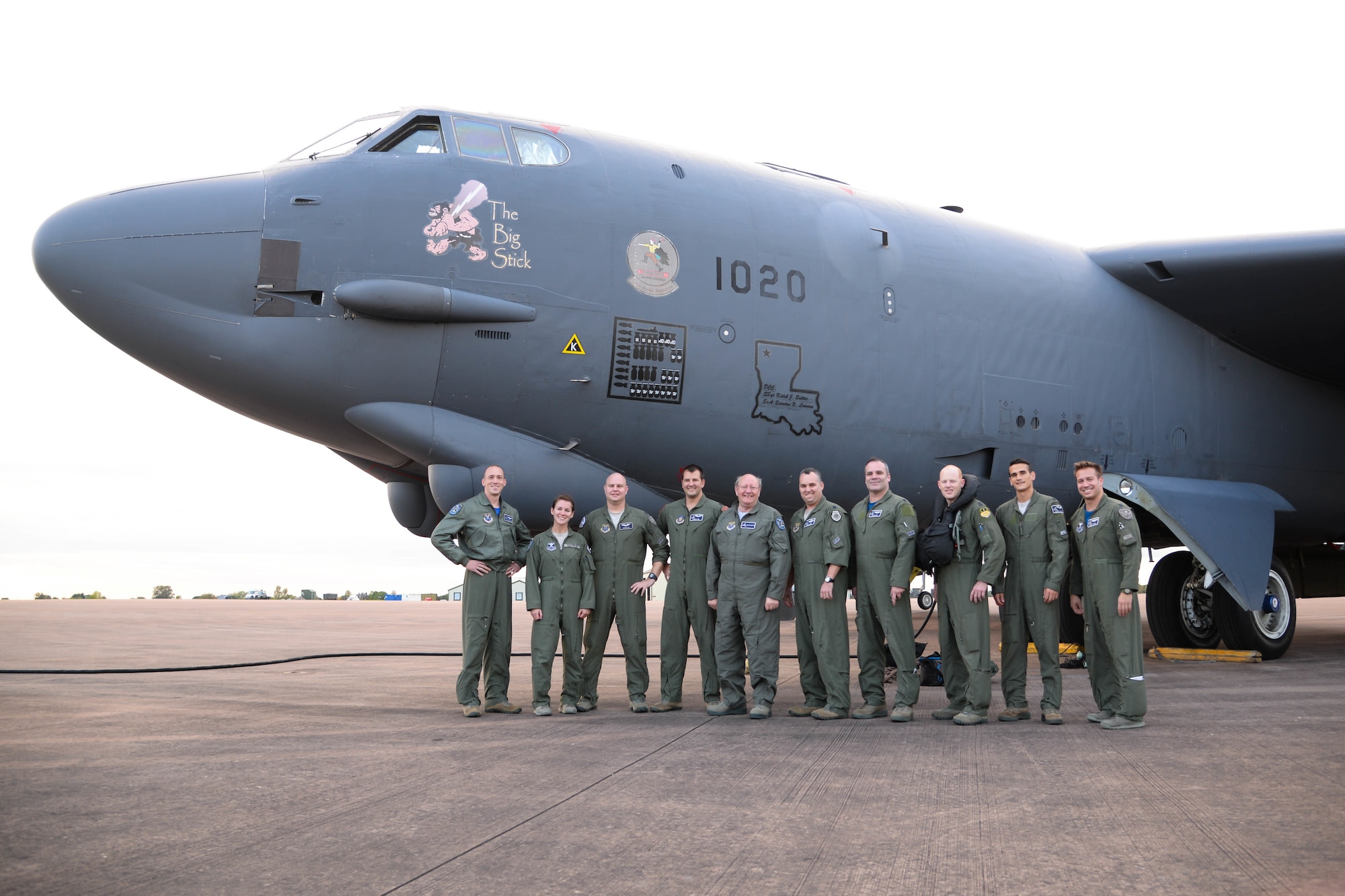 A B-52 Stratofortress aircrew poses for a photo after landing at Fairford Royal Air Force Base, Sept. 22, 2017.