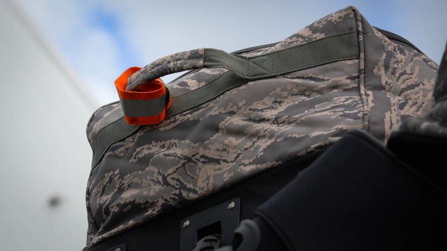 Luggage is unloaded from an aircraft upon its arrival to Fairford Royal Air Force Base, U.K., Sept. 11, 2017.