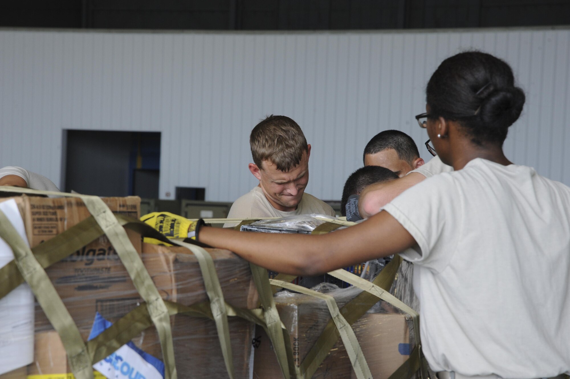 U.S. Air Force Airmen with the 6th Logistics Readiness Squadron (LRS) complete a pallet assembly for Hurricane Maria relief efforts at MacDill Air Force Base, Fla., Oct. 4, 2017.