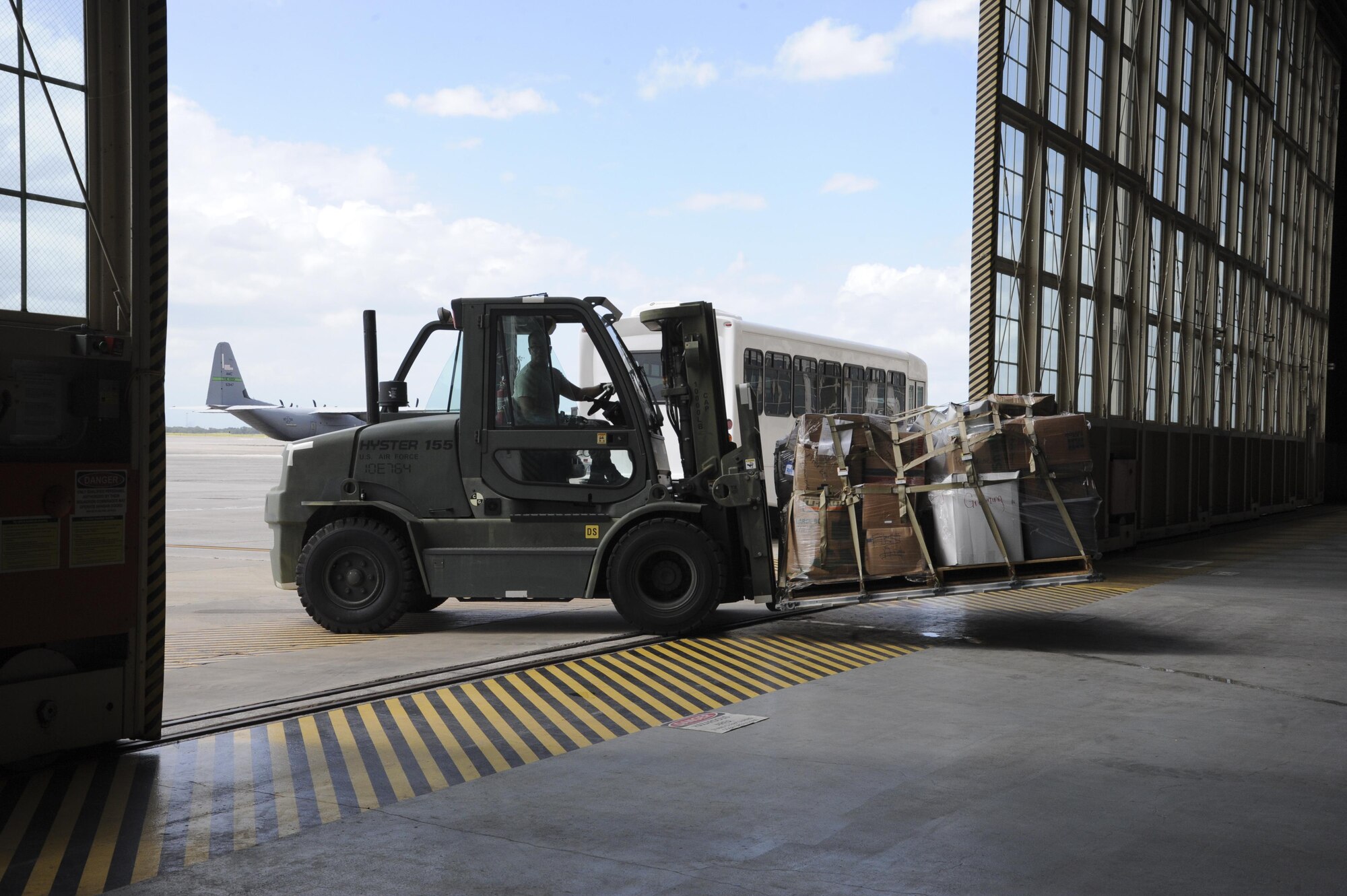 A U.S. Air Force Airman with the 6th Logistics Readiness Squadron (LRS) transports cargo to the flightline at MacDill Air Force Base, Fla., Oct. 4, 2017.