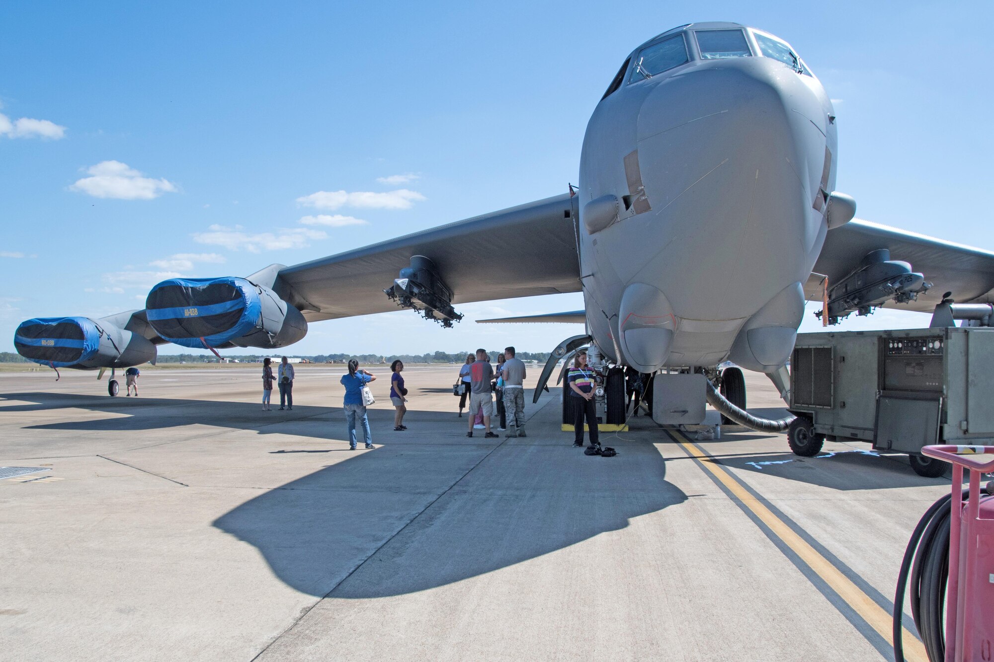 Airmen from the 307th Bomb Wing answer questions and point out features of the B-52 Stratofortress during a tour for the Shreveport Chapter of Ninety-Nines on Barksdale Air Force Base, La. Oct. 6, 2017.