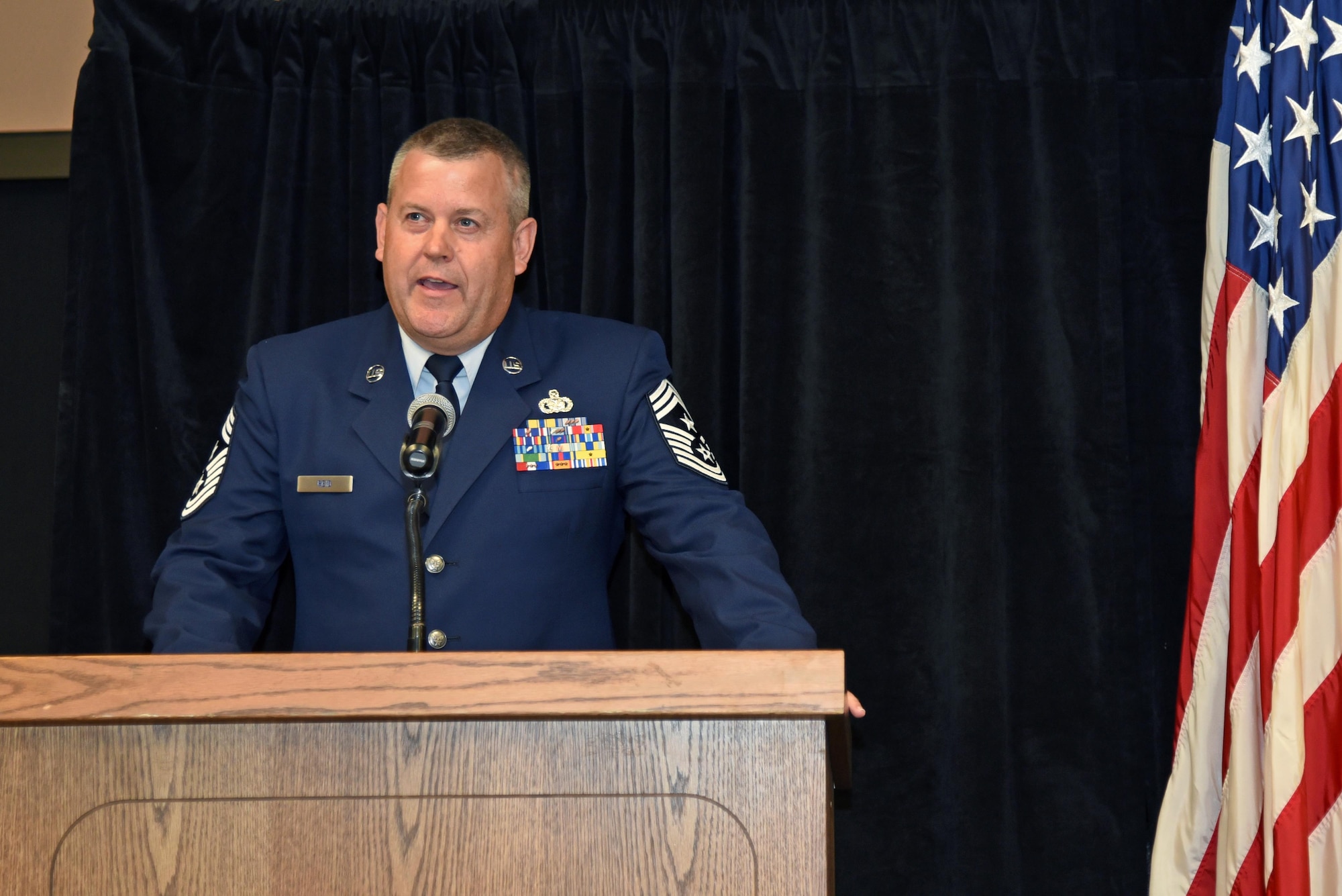Chief Master Sgt. Bert A. Reid, 161st Air Refueling Wing command chief, addresses Airmen after assuming responsibility as the 161st ARW command chief, Oct. 7, 2017. Reid was previously the 161st Logistics Readiness Squadron chief enlisted manager and plans to use his wealth of knowledge and leadership to continually improve the enlisted Airmen’s success here at the wing. (Arizona Air National Guard photo by Staff Sgt. Dillon Davis / Released)