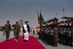 Afghanistan President Ashraf Ghani passes in review of Afghan National Security and Defense Force honor guard Oct. 7, 2017, at Kandahar Airfield, Afghanistan. Ghani ceremonially cut the ribbon officiating the arrival of the first two UH-60A Black Hawk helicopters to the Afghan Air Force fleet. (U.S. Air Force photo by Staff Sgt. Alexander W. Riedel)