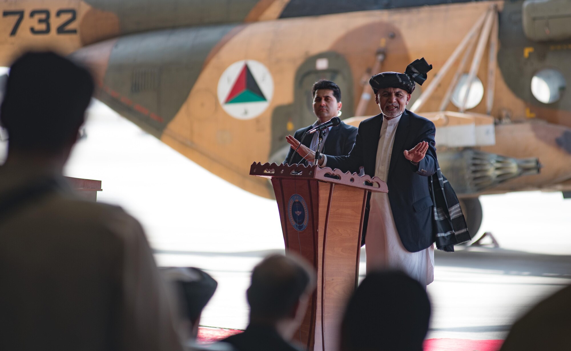 Afghanistan President Ashraf Ghani speaks during the official UH-60 Black Hawk arrival ceremony, Oct. 7, 2017, at Kandahar Airfield, Afghanistan. Ghani and U.S. Army Gen. John W. Nicholson, commander of the Resolute Support Mission and U.S. Forces − Afghanistan, performed a ceremonial ribbon cutting celebrating the newest addition to Afghanistan’s young air force fleet while vowing continued commitment to the fight against the anti-government insurgency in Afghanistan. (U.S. Air Force photo by Staff Sgt. Alexander W. Riedel)