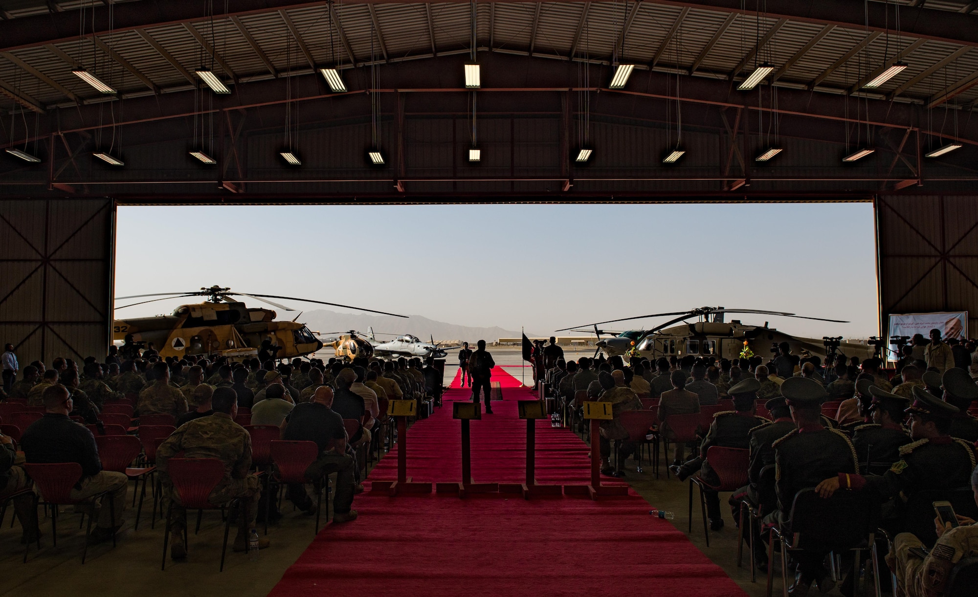 Afghanistan President Ashraf Ghani speaks during the official UH-60 Black Hawk arrival ceremony, Oct. 7, 2017, at Kandahar Airfield, Afghanistan. Ghani and U.S. Army Gen. John W. Nicholson, commander of the Resolute Support mission and U.S. Forces − Afghanistan, performed a ceremonial ribbon cutting celebrating the newest addition to Afghanistan’s air force fleet, while vowing continued commitment to the fight against the anti-government insurgency in Afghanistan. (U.S. Air Force photo by Staff Sgt. Alexander W. Riedel)