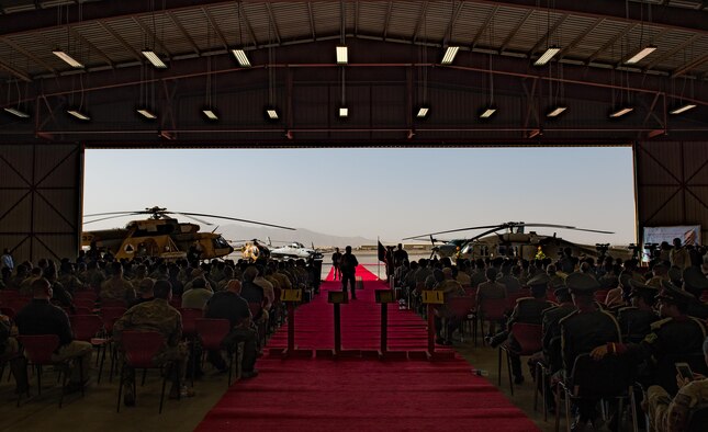 Afghanistan President Ashraf Ghani speaks during the official UH-60 Black Hawk arrival ceremony, Oct. 7, 2017, at Kandahar Airfield, Afghanistan. Ghani and U.S. Army Gen. John W. Nicholson, commander of the Resolute Support mission and U.S. Forces − Afghanistan, performed a ceremonial ribbon cutting celebrating the newest addition to Afghanistan’s air force fleet, while vowing continued commitment to the fight against the anti-government insurgency in Afghanistan. (U.S. Air Force photo by Staff Sgt. Alexander W. Riedel)