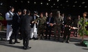 Senior Afghan government officials and coalition defense leaders share in a ribbon cutting symbolizing the transfer of ownership of the first UH-60 Black Hawk helicopter to the Afghan Air Force Oct. 7, 2017, at Kandahar Airfield, Afghanistan. The UH-60 has been selected to enhance the AAF helicopter fleet and augment the capabilities currently provided by the Mi-17 legacy platform. (U.S. Air Force photo by Staff Sgt. Alexander W. Riedel)
