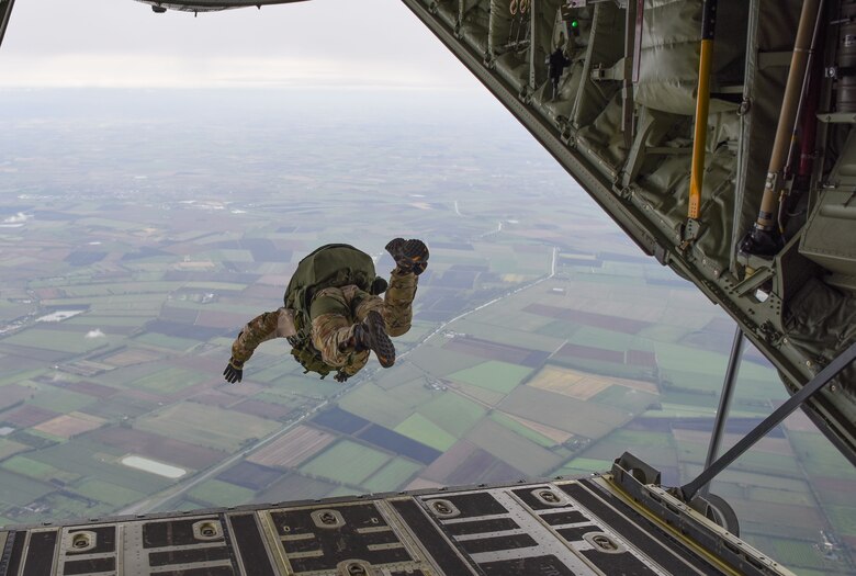 Airmen with the 321st Special Tactics Squadron, 352 Special Operations Wing execute a military free fall jump out of an MC-130J Commando II over southern England, 29 Sept. 2017. The air commandos performed this jump as maintain jump proficiency while ensuring readiness to execute global special operations at a moment's notice.