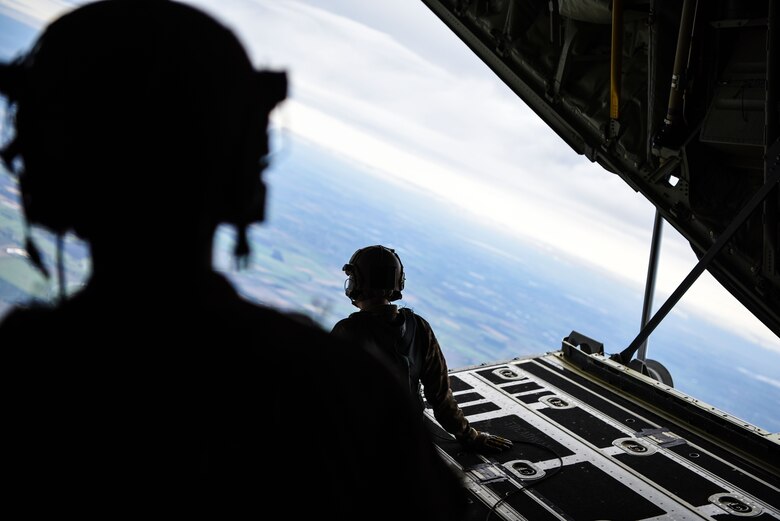 Airmen with the 321st Special Tactics Squadron, 352 Special Operations Wing execute a military free fall jump out of an MC-130J Commando II over southern England, 29 Sept. 2017. The air commandos performed this jump as maintain jump proficiency while ensuring readiness to execute global special operations at a moment's notice.
