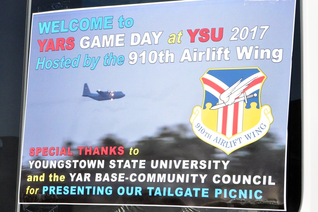 A sign welcomes Citizen Airmen of the Air Force Reserve's 910th Airlift Wing, along with their coworkers, families and friends to a tailgate picnic at YARS Game Day at YSU held here, Sept. 30, 2017.