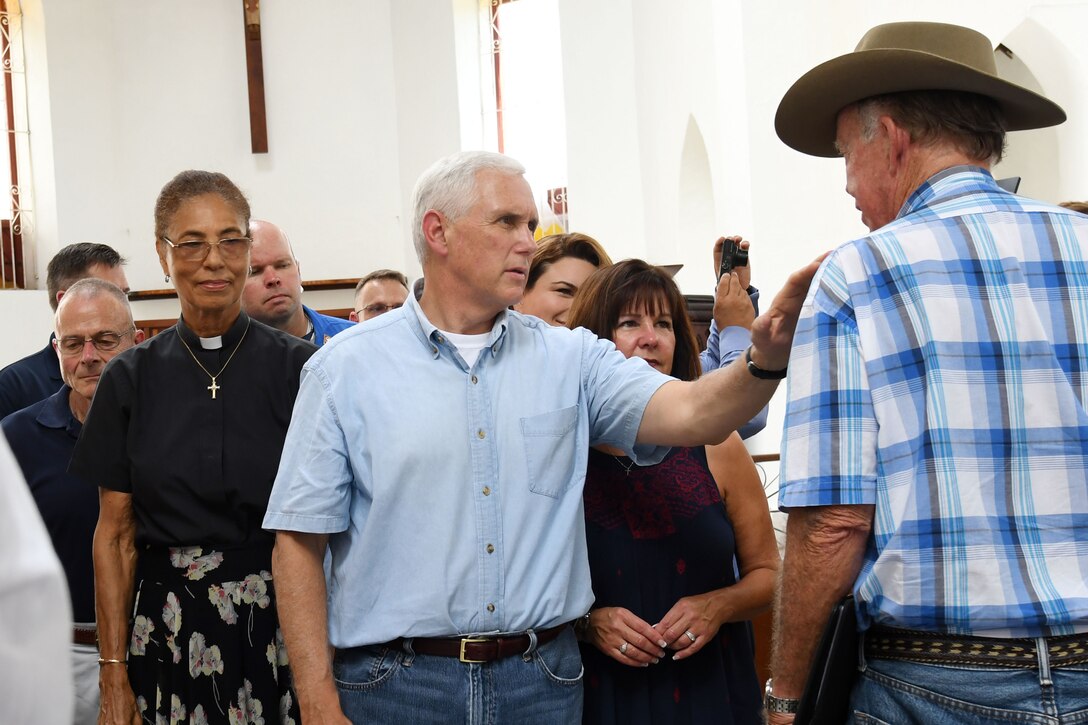 Vice President greets parishoners at church.