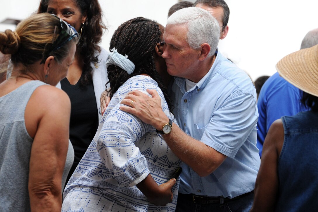 Vice President meets locals at church.