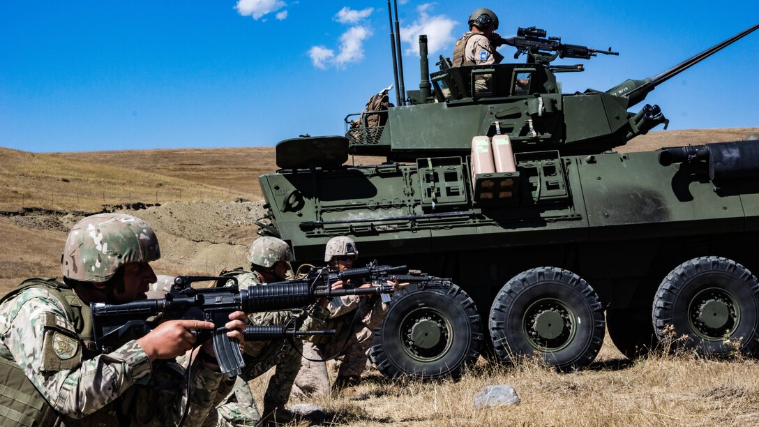 Georgian soldiers participate in a U.S Marine Light Armored Vehicle training event with U.S. Marines from the Marine Forces Reserve during Exercise Agile Spirit in Orpholo, Georgia on Sept. 10, 2017. Exercise Agile Spirit is a multilateral training exercise designed to promote unit cohesion and interoperability between the United States, Georgian, and other Allied and partner nations. (U.S. Marine Corps Photo by Sgt. Kai W. Huber/Released)