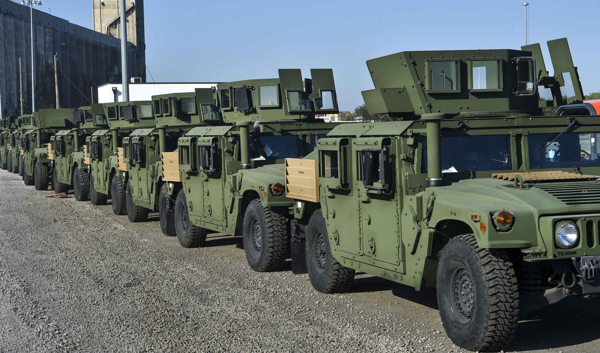Humvees are lined up before being loaded onto the Liberty Maritime Corporation’s ship, Honor, at Joint Base Charleston-Weapons Station, S.C., Sept. 27, 2017.