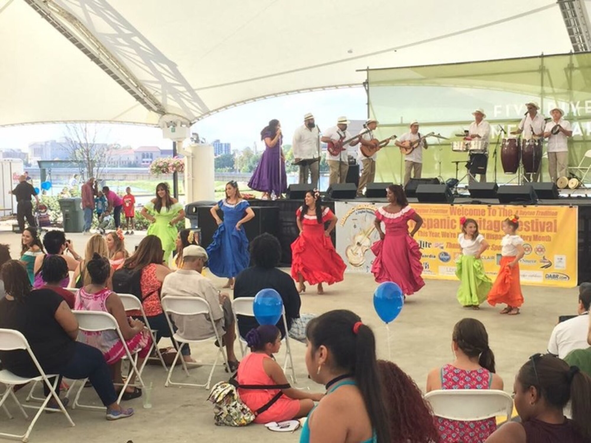 DAYTON, Ohio - Miguel Maldonado, Air Force Research Laboratory Fuels and Energy branch chief, performs on the timbales as part of the band Rondalla de Puerto Rico during the 7th Annual Hispanic Heritage Festival & Parade in Dayton, Ohio Sept. 16, 2017. AFRL recruited Maldonado from Puerto Rico after college and he’s spent the last 30 years bringing Latin culture to the local area.(Courtesy photo/Miguel Maldonado)