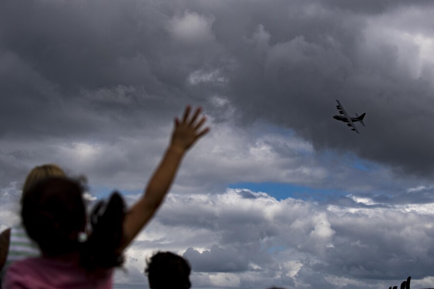 Airmen and families await the return of the 71st Rescue Squadron (RQS) during a redeployment, Oct. 6, 2017, at Moody Air Force Base, Ga. Airmen from the 71st RQS supported deployed operations by providing expeditionary personnel with on-call recovery forces should they need rescued. (U.S. Air Force photo by Airman 1st Class Daniel Snider)