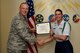 U.S. Air Force Lt. Col. Steven Watts, 17th Training Group deputy commander, 315th Training Squadron Student of the Month award for Sept. 2017 to Airman Patricia Denman, 315th Training Squadron trainee, in the Brandenburg Hall on Goodfellow Air Force Base, Texas, Oct. 5, 2017. The 17th Training Wing's mission is to develop and inspire exceptional intelligence, surveillance and reconnaissance, and fire protection professionals for America and her allies. (U.S. Air Force photo by Airman 1st Class Randall Moose/released)