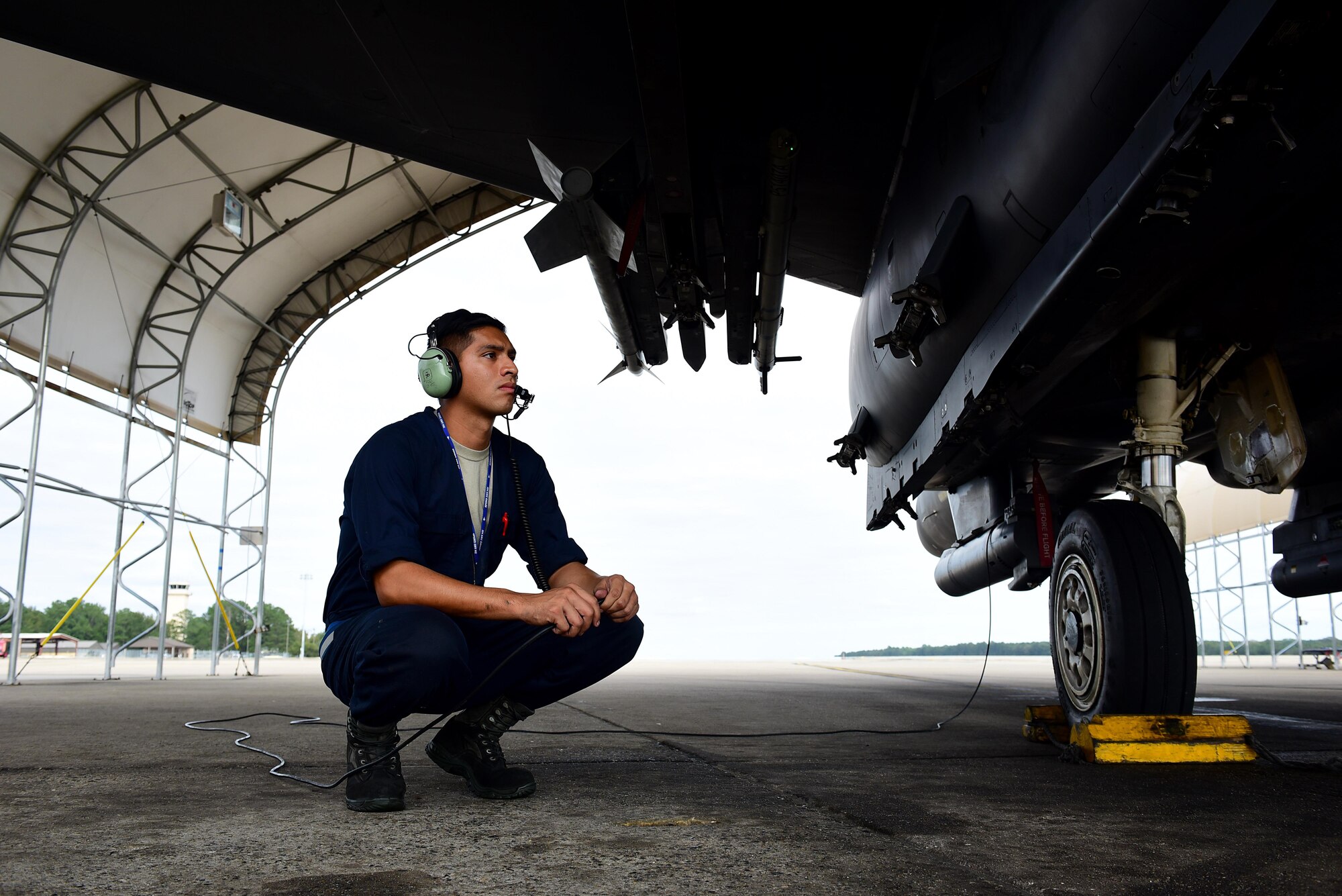 Senior Airman Juan Cruz, 4th Aircraft Maintenance Squadron crew chief, conducts a preflight check, Oct. 4, 2017, at Seymour Johnson Air Force Base, North Carolina. Cruz was highlighted during Hispanic Heritage Month for being recognized as an outstanding Airman by his leadership. (U.S. Air Force photo by Airman 1st Class Kenneth Boyton)