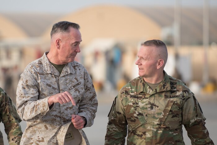Joint Chiefs chairman talks with his senior enlisted advisor.