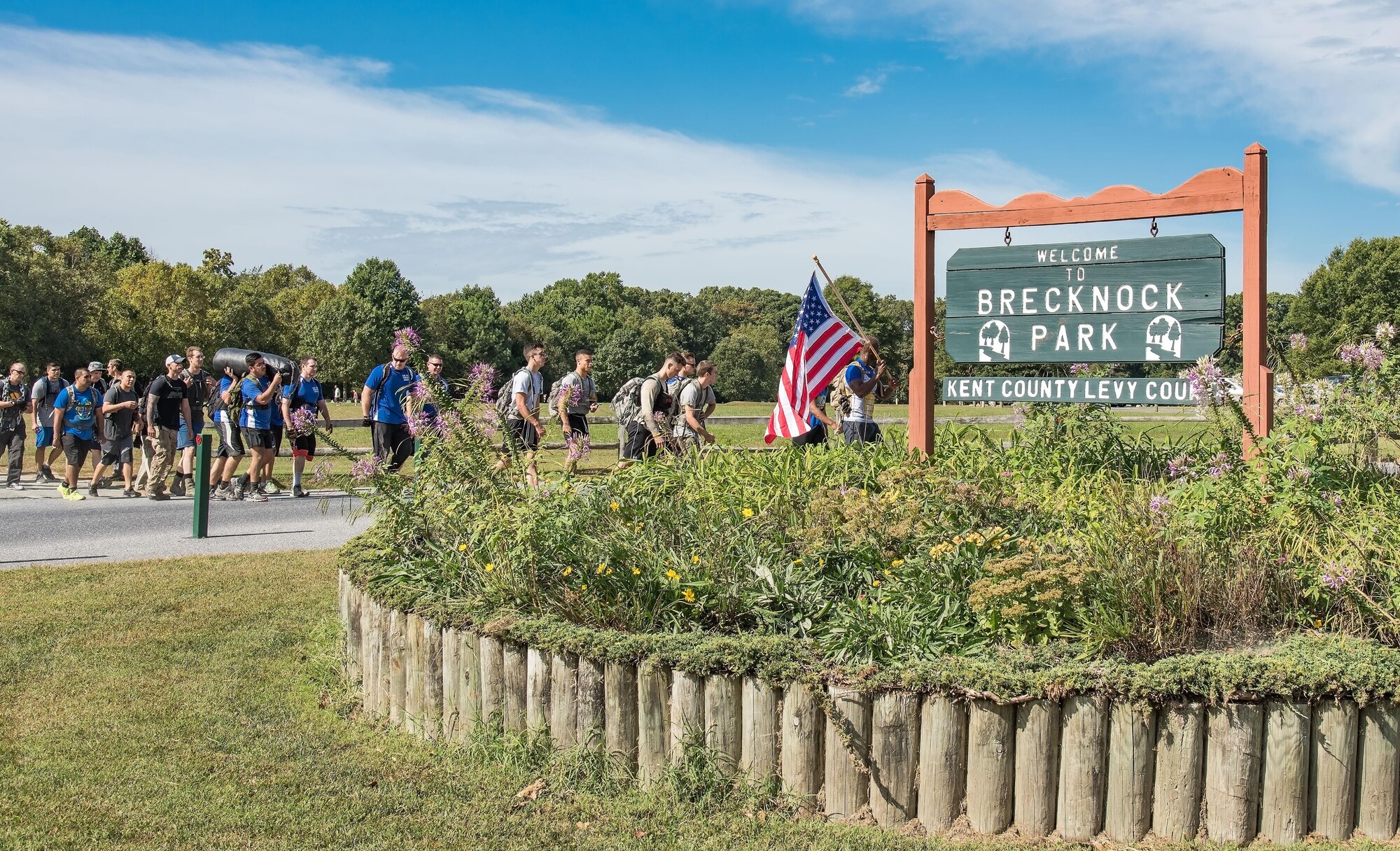 Participants in the 2017 GORUCK Light Challenge begin the first of three laps on the hiking trail Oct. 6, 2017, at Brecknock Park in Camden, Del. The hike was the last challenge of the day. (U.S. Air Force photo by Roland Balik)