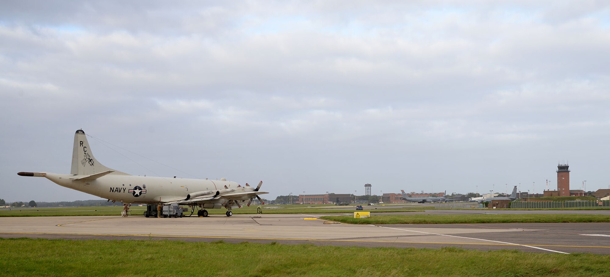 A U.S. Navy P-3C Orion aircraft sits on the flightline Oct. 2, 2017, on RAF Mildenhall, England. Two U.S. Navy aircraft were returning from a six-month deployment in support of U.S. Central Command operations and stopped overnight at RAF Mildenhall on their way home to Naval Air Station Whidbey Island, Wash. (U.S. Air Force photo by Karen Abeyasekere)